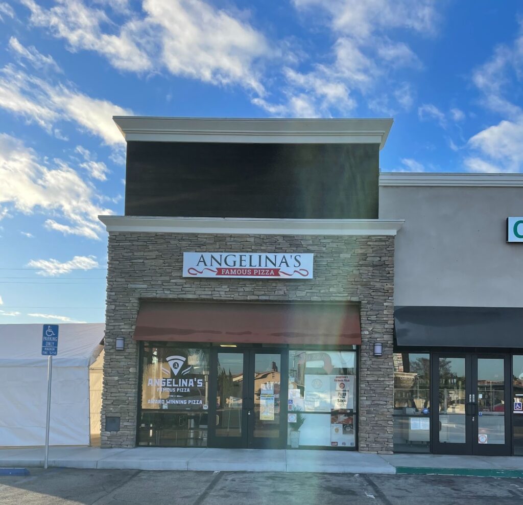 Anglina’s Famous Pizza storefront and sign