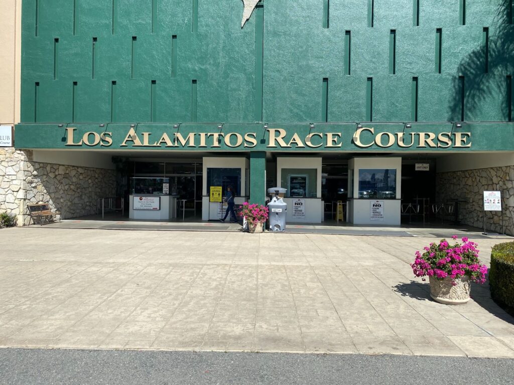 Main arena entrance signage at Los Alamitos Race Course