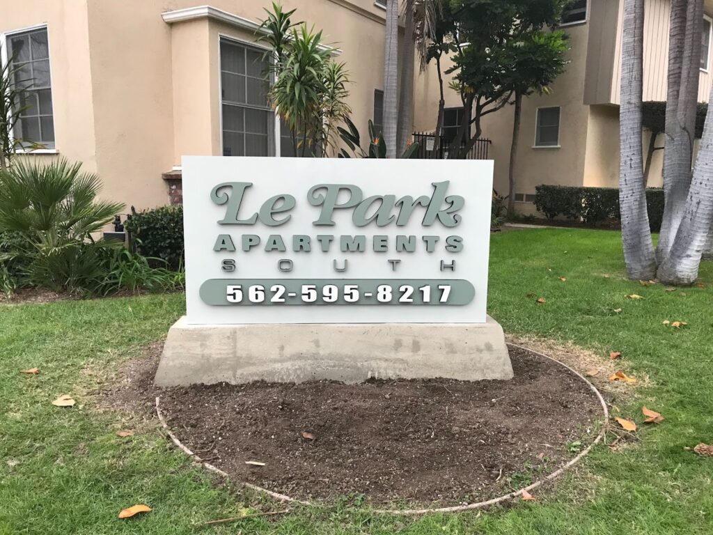 A custom monument sign advertising Le Park Apartments
