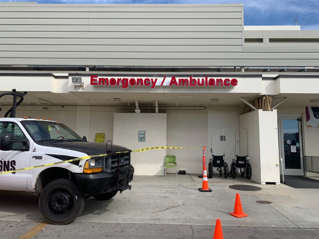 Raceway mounted channel letter sign for an emergency ambulance area