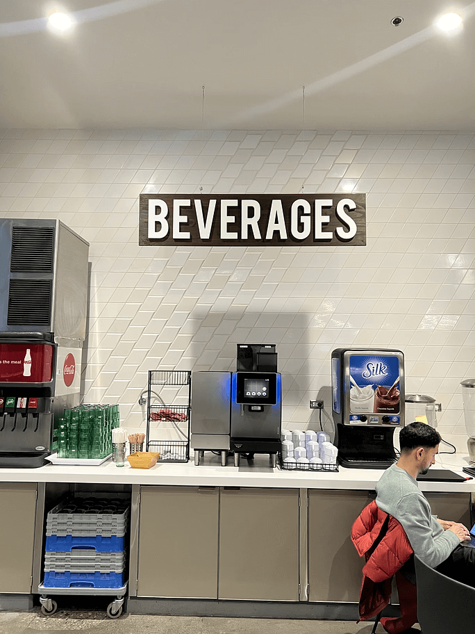 a hanging brown sign reading BEVERAGES