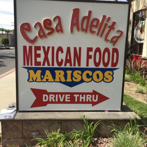 a monument sign for a Mexican food restaurant called Casa Adelita