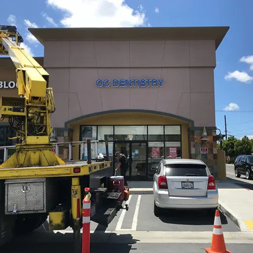 daytime exterior of a dental office with channel letters