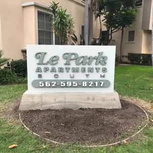 A custom monument sign advertising Le Park Apartments